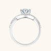 Infinito - Twist Six Claw Moissanite Ring