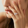 Infinito - Twist Six Claw Moissanite Ring