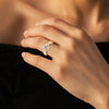 Infinito - Twist Six Claw Moissanite Ring
