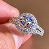 Rayonnement - Halo Split Shank Round Cut Moissanite Ring